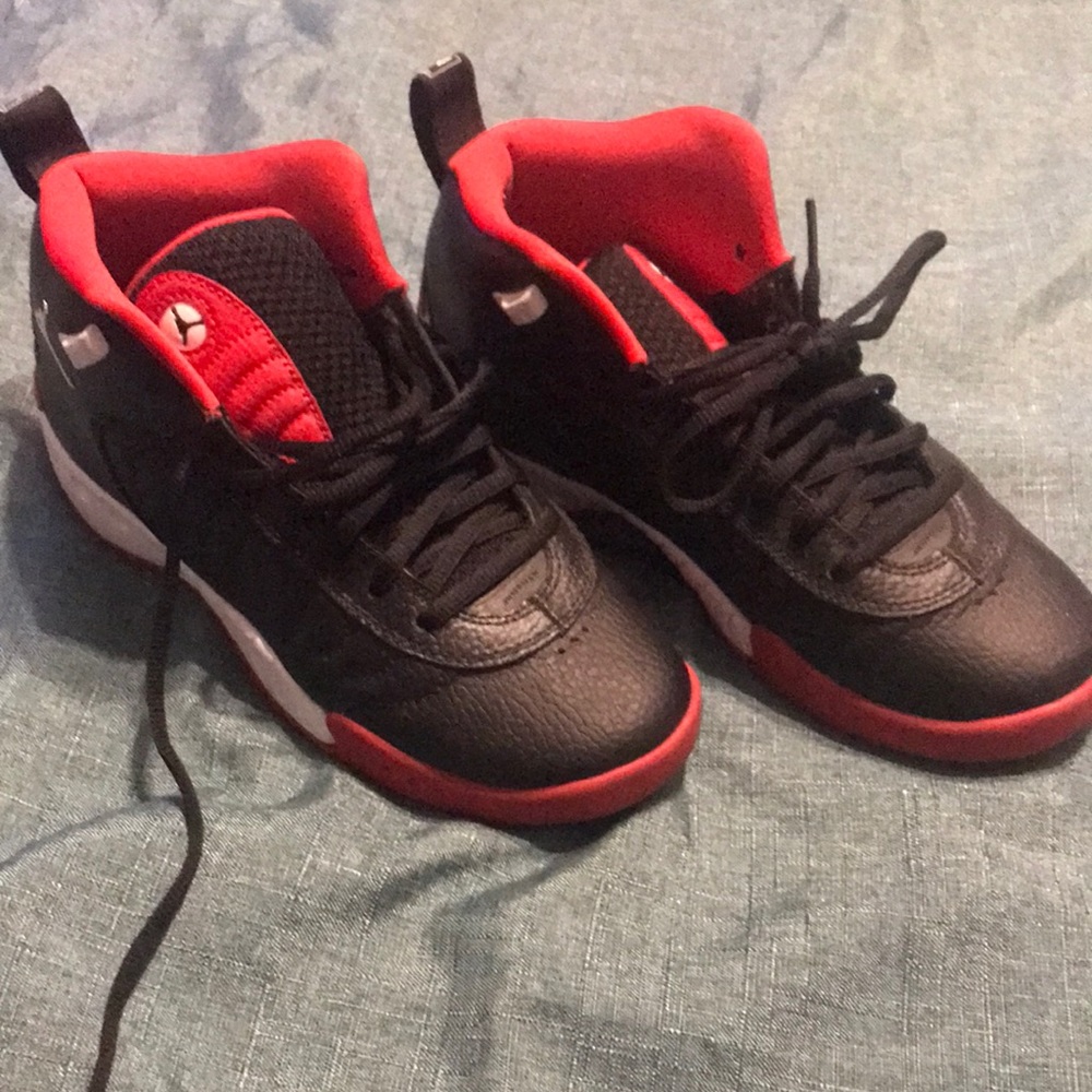 Red black and white Jordan sneakers